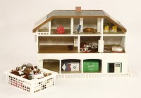 Lot 408 - A dolls house and furniture