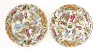 Lot 1079 - A pair of Chinese famille rose plates