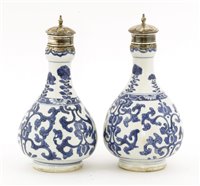 Lot 45 - A pair of Chinese blue and white bottles