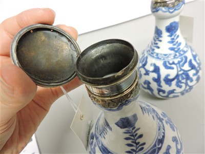 Lot 45 - A pair of Chinese blue and white bottles