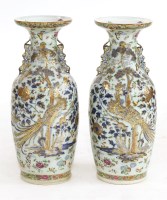 Lot 1101 - A pair of Chinese Canton enamelled vases