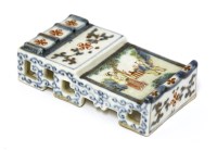 Lot 1109 - A Chinese famille rose brush rest