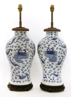 Lot 1167 - A pair of Chinese blue and white vases