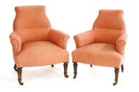 Lot 1157A - A pair of pink armchairs