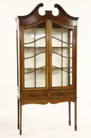 Lot 1046 - An Edwardian mahogany display cabinet