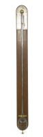 Lot 887 - A George III mahogany stick barometer