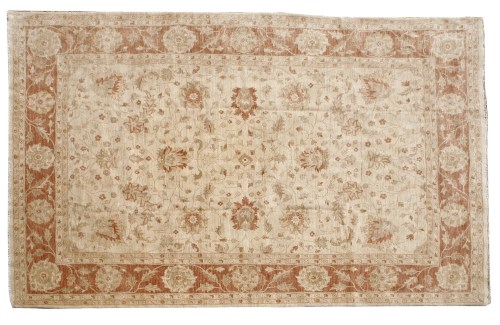 Lot 960 - A large pastel ground carpet