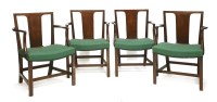 Lot 986 - A set of four mahogany elbow chairs