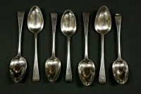 Lot 289 - Seven Georgian silver Old English pattern table spoons