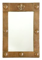 Lot 65 - An Arts and Crafts copper wall mirror