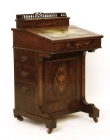 Lot 1101 - An Edwardian inlaid walnut Davenport desk