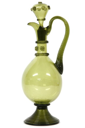 Lot 730 - A 17th century style green glass claret jug