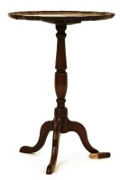 Lot 956 - A George III mahogany elm tripod table