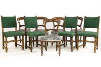 Lot 1031 - A set of five Victorian balloon backed dining chairs