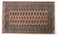 Lot 1091 - A modern pink ground Persian carpet