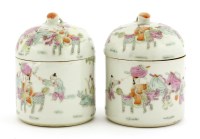 Lot 1522 - A pair of Chinese famille rose boxes and covers