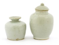 Lot 1385 - A Korean white-glazed porcelain jar and cover