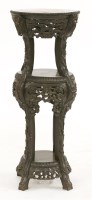 Lot 1374 - A Chinese hardwood vase stand