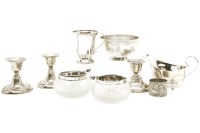 Lot 310 - Silver items: a pair of cut glass ashtrays with silver rims (only)