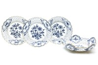 Lot 734 - Three Meissen blue and white reticulated border plates