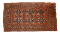 Lot 1043 - A 20th century Afghan carpet