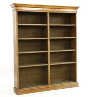 Lot 1124 - A Victorian oak open bookcase
