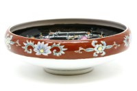 Lot 743 - An Oriental bowl with famille noir style decoration