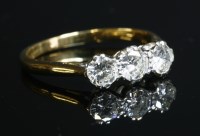 Lot 448 - A three stone diamond ring with three brilliant cut diamonds