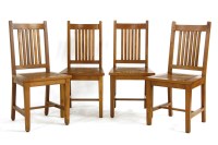 Lot 1109 - A set of four lathe back dining chairs