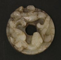 Lot 1190 - A Chinese jade bi disc