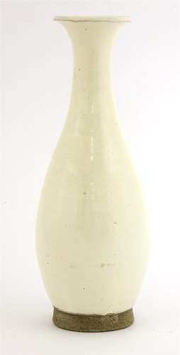 Lot 1040 - A Chinese white-glazed vase