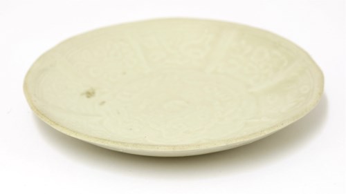 Lot 1042 - A Chinese white-glazed saucer