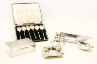 Lot 323 - A set of six silver seal topped coffee spoons
