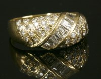 Lot 431 - An 18ct gold bombé diamond ring