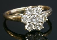 Lot 77 - An Edwardian diamond cluster ring