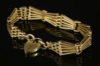 Lot 674 - A 9ct gold four row fan-shaped gate bracelet