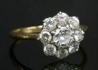 Lot 424 - A five stone diamond cluster ring