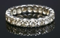 Lot 289 - A diamond set full eternity ring