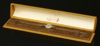 Lot 263 - A ladies' diamond set Cyma mechanical cocktail watch on a later bracelet