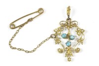 Lot 211 - An Edwardian gold cabochon turquoise and seed pearl filigree pendant