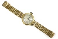 Lot 214 - A ladies 18ct gold mechanical watch
