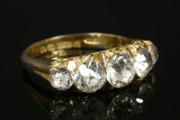Lot 639 - An early 20th century 9ct gold carved head paste ring
