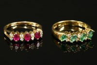 Lot 741 - An 18ct gold four stone marquise cut emerald and diamond ring