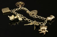 Lot 778 - A 9ct gold curb link charm bracelet