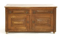 Lot 1134 - An Arts and Crafts oak side cabinet