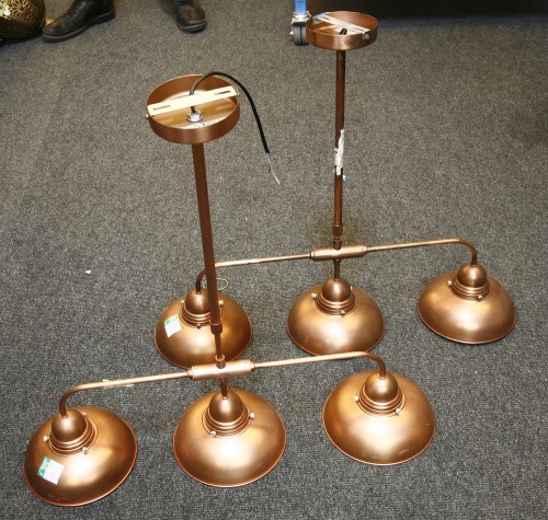 Lot 657 - A pair of copper effect three branch electrical lights by Däär