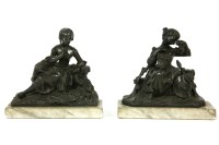Lot 753 - A pair of spelter figures of reclining girls