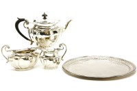 Lot 384 - A silver three piece tea set