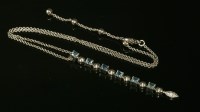 Lot 396 - A white gold aquamarine and diamond set Lucea pendant by Bulgari