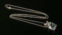 Lot 397 - A white gold aquamarine and diamond Liens pendant by Chaumet